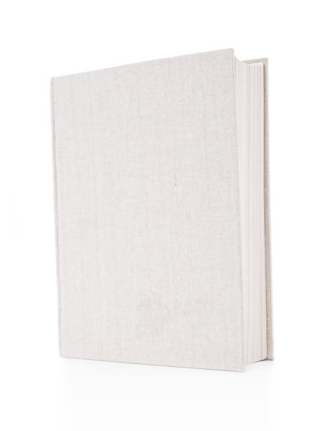 istock Book with gray hardcover close up on white background 1391081782