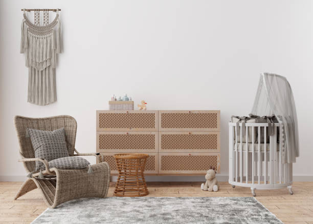istock Empty white wall in modern child room. Mock up interior in scandinavian, boho style. Copy space for your picture or poster. Console, rattan armchair, toys, macrame. Cozy room for baby. 3D rendering. 1391084281