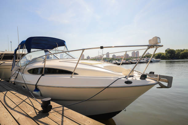 Luxury motor boat moored near the pier in the harbor