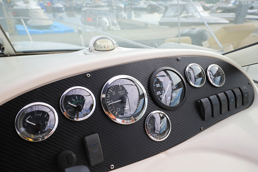 Modern motor boat dashboard with navigation devices