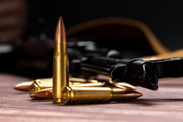 istock Bullets against Kalashnikov assault rifle 1391085855