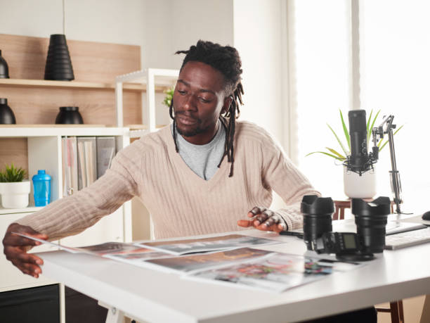 istock Graphic designer/photographer working in home office 1391086435