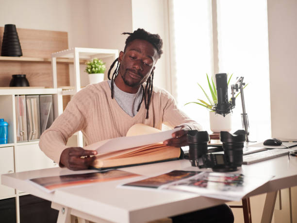 istock Graphic designer/photographer working in home office 1391086458