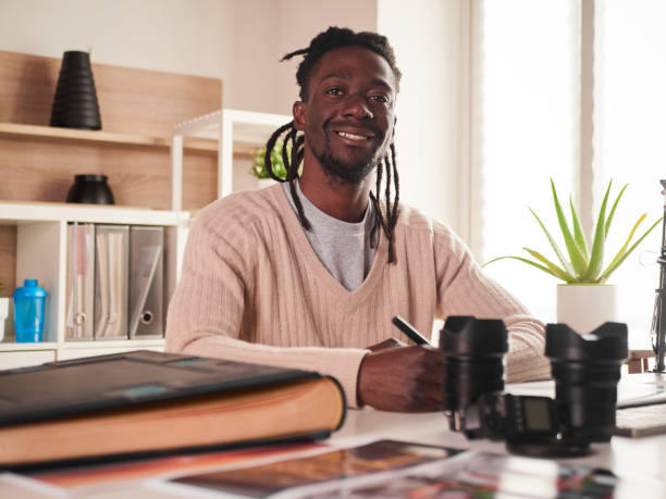 istock Graphic designer/photographer working in home office 1391086486