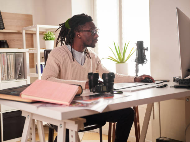 istock Graphic designer/photographer working in home office 1391086554