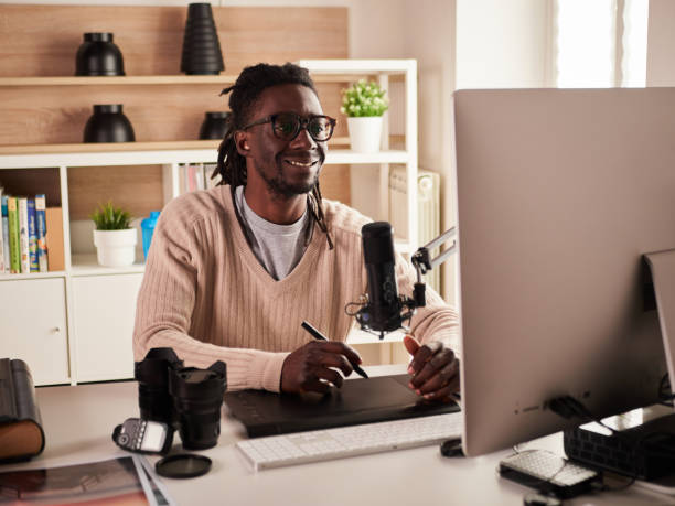 istock Graphic designer/photographer working in home office 1391086579