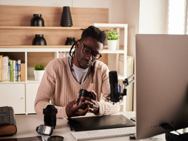 istock Graphic designer/photographer working in home office 1391086618