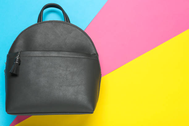 istock Stylish urban backpack on color background, top view. Space for text 1391087114