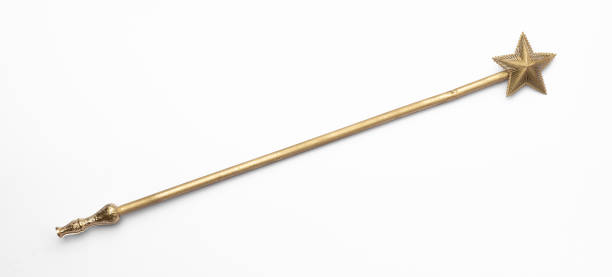 istock golden magic staff isolated on white background 1391087779