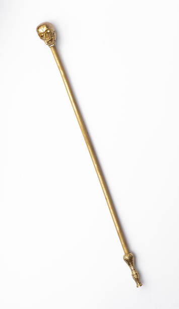 istock golden magic staff isolated on white background 1391087797
