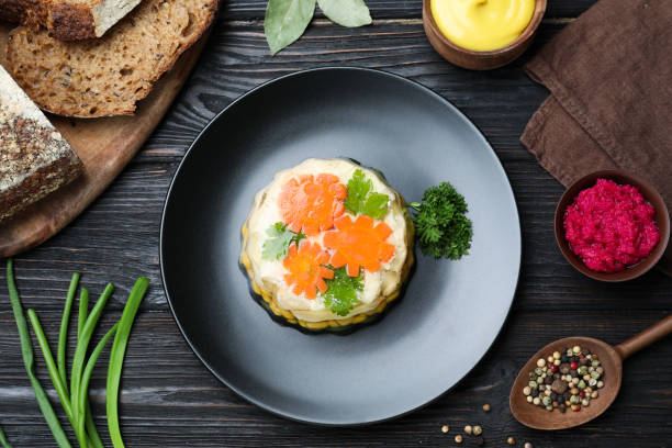 Delicious homemade chicken aspic served on black wooden table, flat lay Delicious homemade chicken aspic served on black wooden table, flat lay aspic stock pictures, royalty-free photos & images