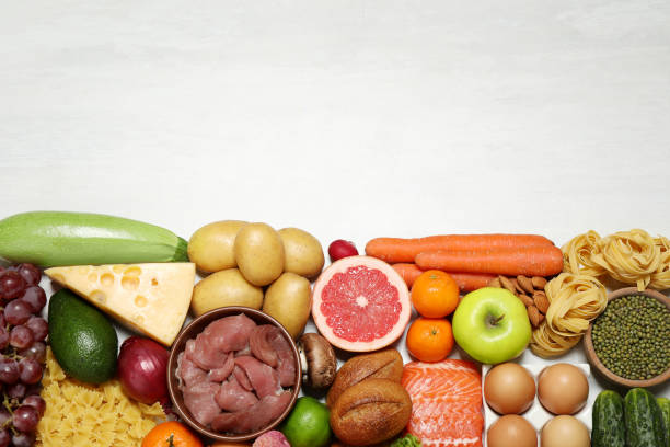 istock Different products on white table, top view. Healthy food and balanced diet 1391088001