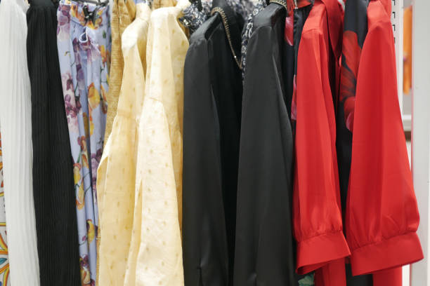 istock close up of stack of clothes hanging 1391088445