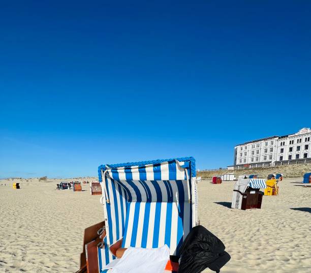 Beach chair, blue striped, in spring, Borkum beach