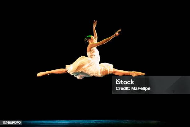 Teenage Girl Dancing Neoclassical Ballet On Stage Stock Photo - Download Image Now - Ballet, Jumping, Performing Arts Event