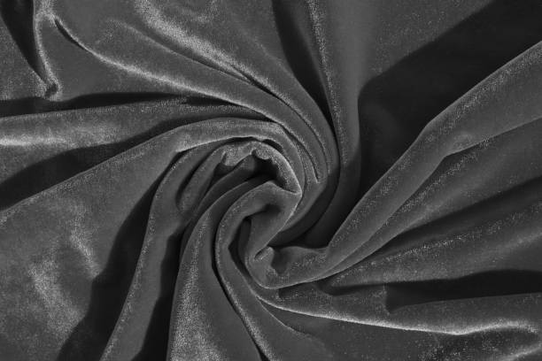 istock Gray velvet spun fabric in the middle. Abstract texture. 1391089851