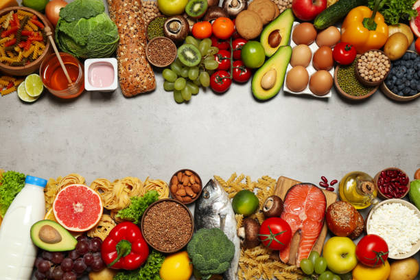 istock Different food products on light grey table, flat lay with space for text. Healthy balanced diet 1391089950