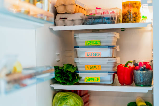 istock Healthy diet plan for weight loss, daily ready menu, lunch boxes cooked in advance and ready to be served for lunch, stand in fridge. Containers with eco friendly healthy food. Pre-cooking concept. 1391094719