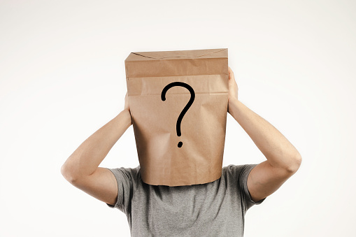 Man wearing a paper bag.