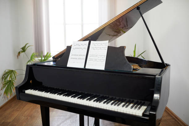istock Grand piano with sheet music in the classroom 1391097921