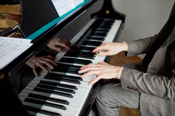 istock Pianist playing the piano at lesson 1391098655
