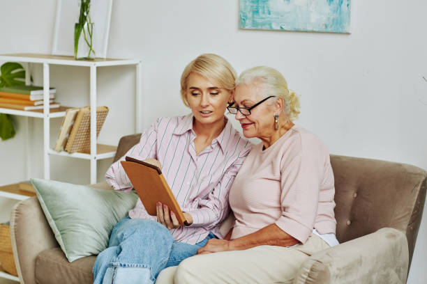 istock Daughter Helping Senior Woman with Internet 1391098776