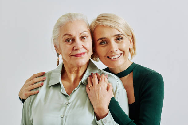 istock Smiling Woman Embracing Mother 1391098886