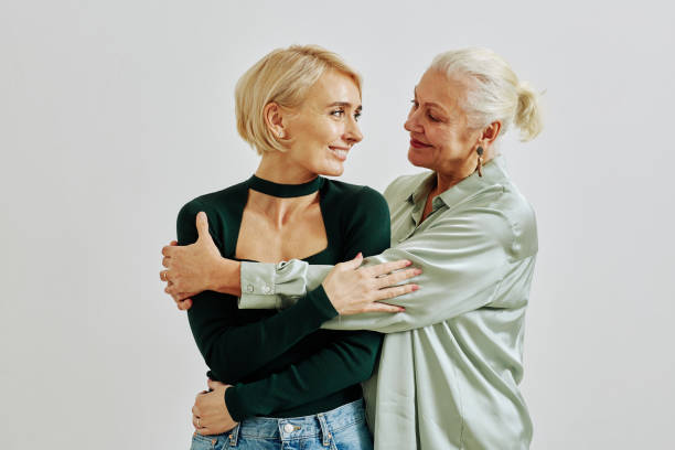 senior mother with daughter minimal - flower dna bildbanksfoton och bilder