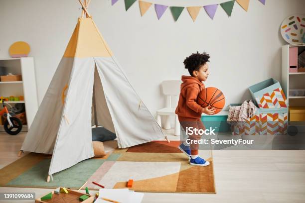 Little Boy In Cute Playroom Stock Photo - Download Image Now - Basketball - Sport, Basketball - Ball, Baby - Human Age