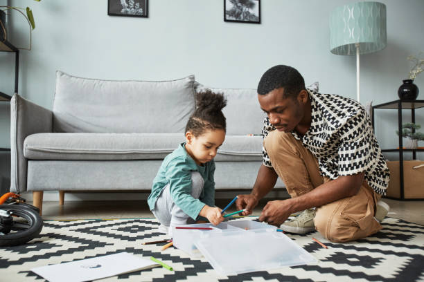 istock African American Father and Son Drawing Together 1391100203
