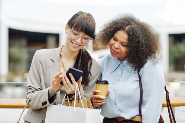 istock Two Girls Shopping Together 1391101039