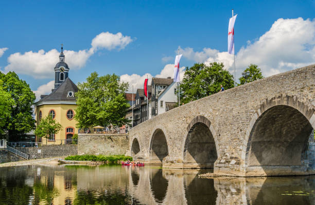 istock Old stone bridge on the river Lahn in Wetzlar 1391102064