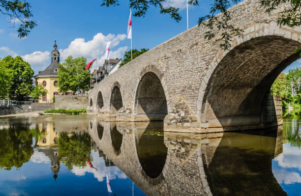 istock Old stone bridge on the river Lahn in Wetzlar 1391102100