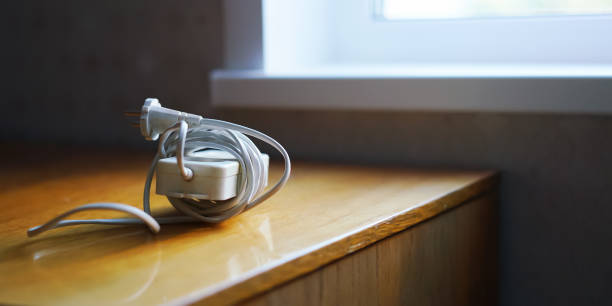 istock coiled extension cord put on table near windowsill closeup 1391102556