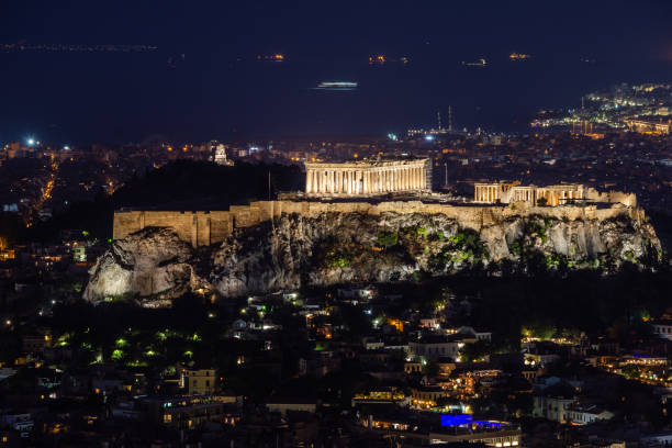istock Illuminated Acropolis with Parthenon at night, Athens, Greece. 1391104377