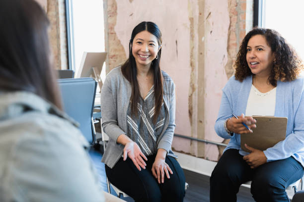 istock Managers smile encouragingly at prospective employee 1391105392