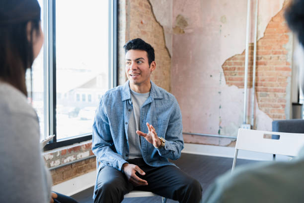 istock Male creative shares idea during brainstorming meeting 1391105404