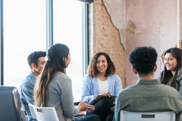 istock Diverse people gather for employee engagement meeting 1391105414