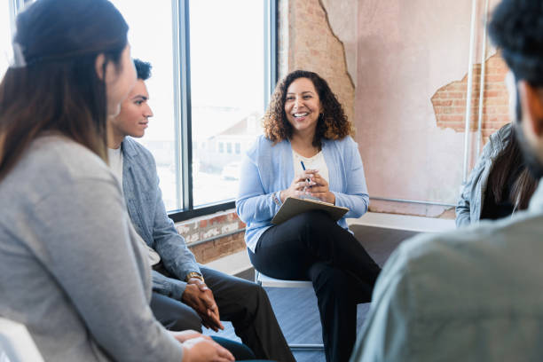 istock Female manager greets team ideas with smile 1391105594