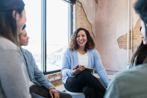 istock Human resources representative leads relaxed employee engagement meeting 1391105597