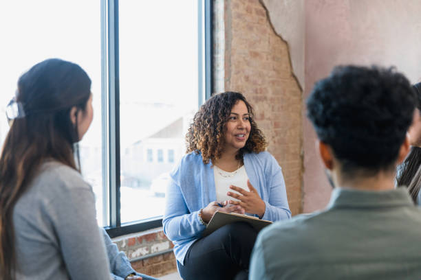 istock Manager interacts with unrecognizable employee in meeting 1391105598
