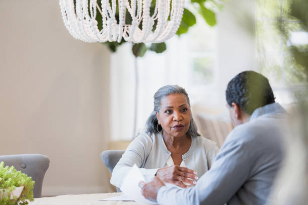 istock Senior couple has serious discussion about home finances 1391105721