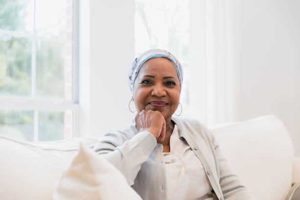istock Mature woman holds chin 1391105902