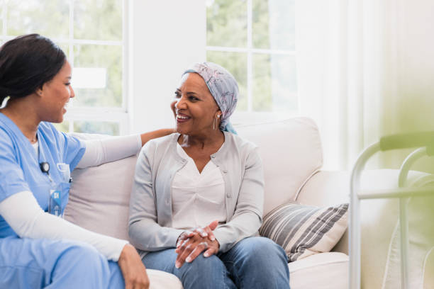 istock Nurse listens to her patient 1391105920