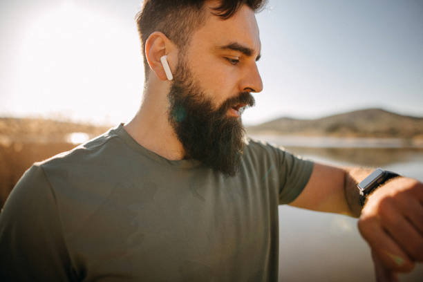 istock Man with large beard standing outdoors 1391105958