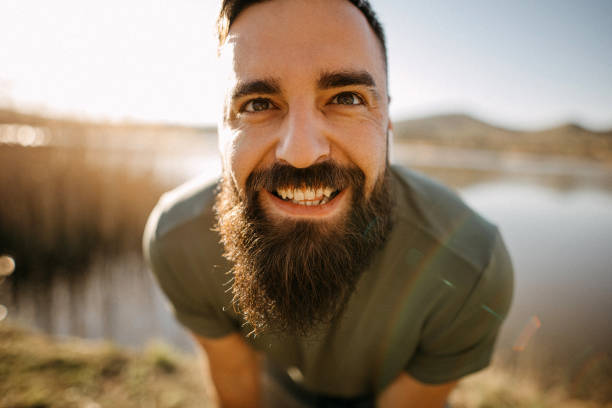 istock Man with large beard standing outdoors 1391105974