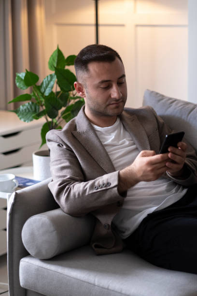 istock Hands of man using online virtual app on mobile phone 1391106288