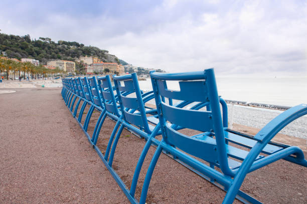 istock The blue chairs of Nice 1391107068