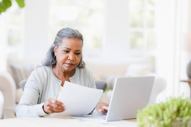 Serious senior widow worried about home finances