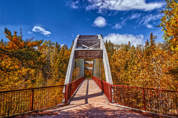 The bridge to the jungle comes live in fall - Ouimet Canyon, Thunder Bay, ON, Canada stock photo